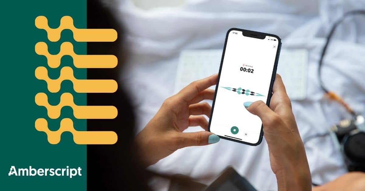 Woman holding an iPhone with Amberscript transcription app launched on screen