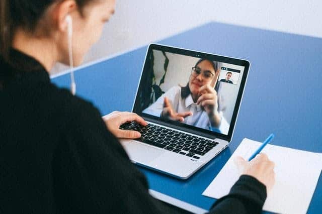 Teacher and a student during remote online classes