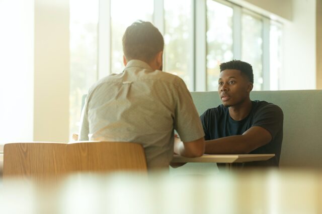 two men in interview