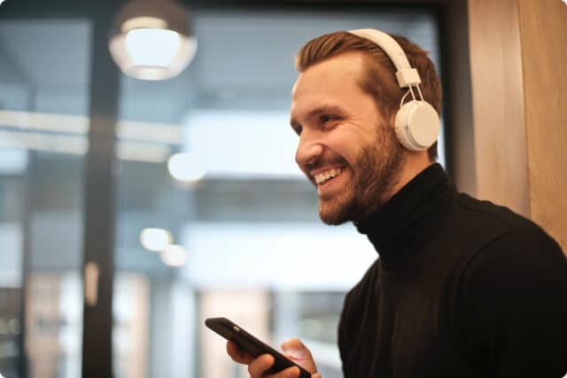 man listening to headphones