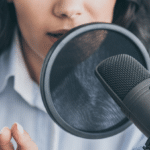 woman talking into microphone