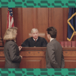 Courtroom scene: two lawyers talking to a judge.
